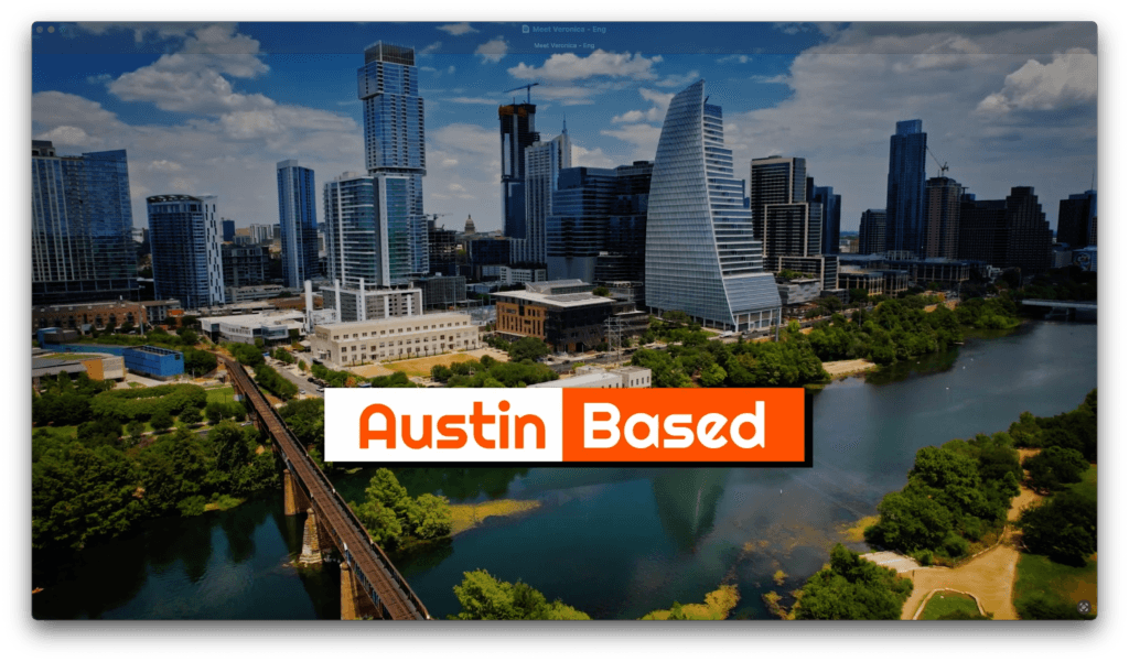 Screenshot 2026-06-01 at 11817 PM | V.Valenzuela Law Aerial view of downtown Austin with modern skyscrapers, a river in the foreground, and a bridge crossing the water; banner reads 'Austin Based' in orange.