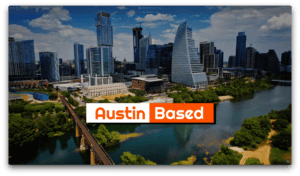 Screenshot 2026-06-01 at 11817 PM | V.Valenzuela Law | V.Valenzuela Law Aerial view of downtown Austin with modern skyscrapers, a river in the foreground, and a bridge crossing the water; banner reads 'Austin Based' in orange.
